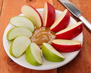 healthy post workout snacks - apples and peanut butter